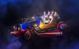 Caractacus Potts, Jeremy, Jemima and Truly Scrumptious in Chitty Chitty Bang Bang flying at night