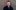 Steven Knight Creator Steven Knight stands against a grey brick wall