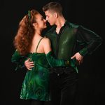 Amy Mae Dolan and Will Bryant wearing green, dance close, faces almost touch