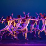 Dancers in nude undergarments leaping