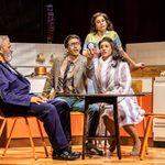 Luke Latchman holds out a round rubix cube at the kitchen table in awe as Christopher Glover, Poppy Tierney and Nikita Johal look at it confused.