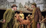 Arthur Narracott (Gareth Radcliffe) and Ted Narracott (Karl Haynes) argue over a money bag and foal Joey (puppeteers Eloise Beaumont-Wood, Diany Samba-Bandza, Jordan Paris)