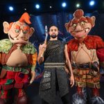 Two giant humanoid puppets behind an axe wielding Jack (Ashley Banjo)