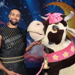 Jack (Ashley Banjo) scratches the pantomime cow under the chin