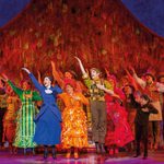 Mary, Bert, Michael, Jane and ensemble in bright lower-class victorian clothes, hand to chest and other lifted in the air whilst singing