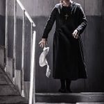 Nun Sister Angelica ( Natalya Romaniw) throws her habit off as she goes down stairs