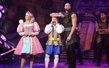 Jack (Ashley Banjo) rests his arm on Silly Simon's (Kev Orkain) head. Silly Simon plugs his nose away from Jacks armpit as Princess Jill (Lauren Hampton) looks away from their antics, supressing a smile.