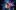 Cirque Eloize-960X600 Double-vision image of man jumping over pink to orange ombre iD reloaded logo. Crowds cheer to either side and in the background towerblocks rise up. 4 stars 'Mind-blowing!' LondowTheatre1 'Circus and dance-fuelled adrenaline rush!' Metro