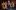 In a western bar, Carrie Hope Fletcher plays guitar with a band