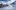 Mountaineer backcountry ski walking ski alpinist in the mountain Mountaineer backcountry ski walking ski alpinist in the mountains. Ski touring in alpine landscape with snowy trees. Adventure winter sport.